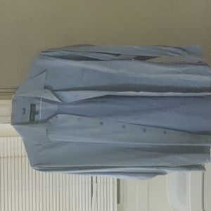 Long sleeve button up collared shirt